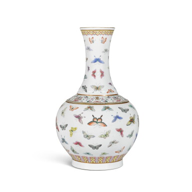 View full screen - View 1 of Lot 229. A famille-rose 'butterfly' bottle vase Mark and period of Guangxu | 清光緒 粉彩百蝶紋長頸瓶 《大清光緒年製》款.