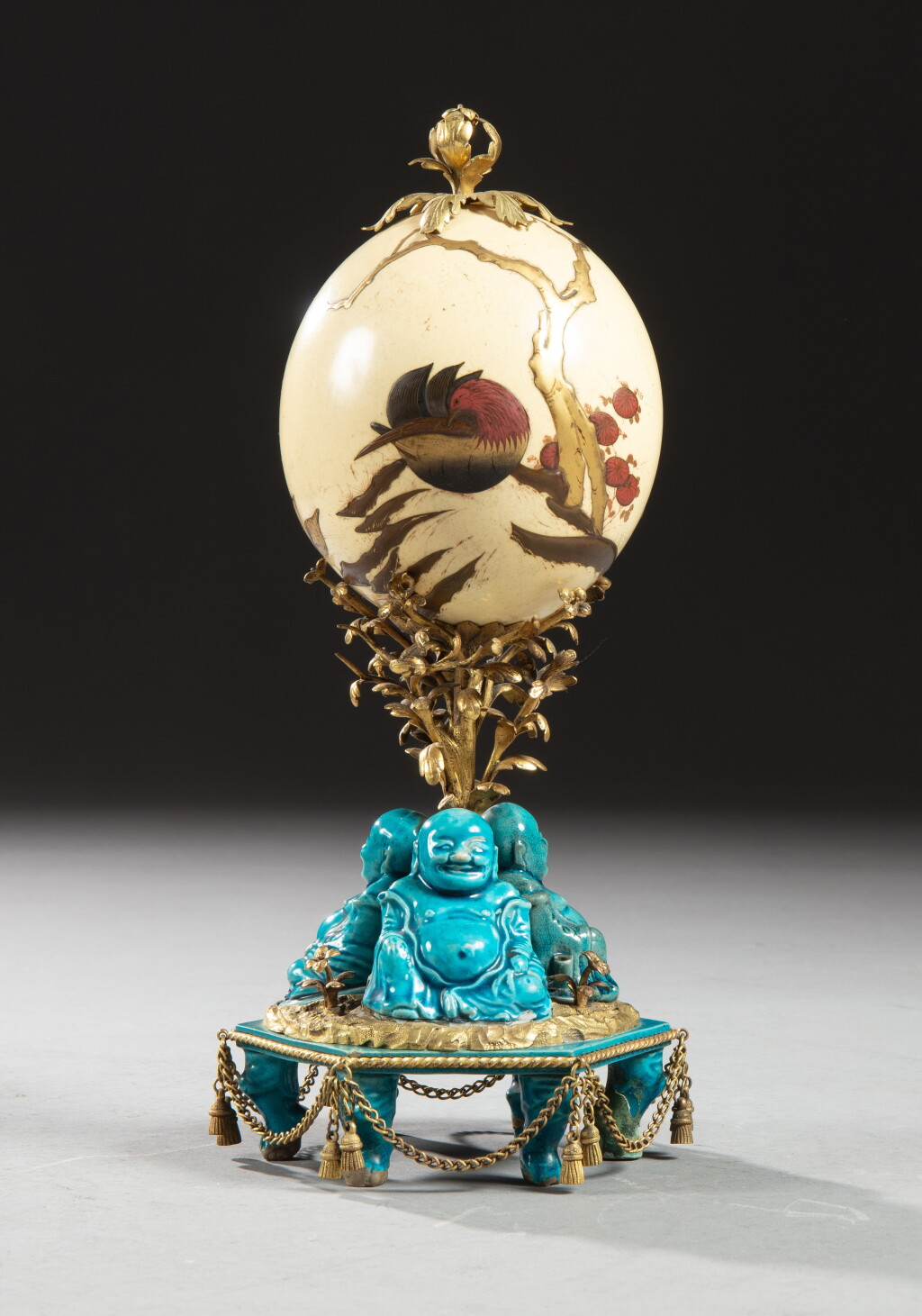 View full screen - View 1 of Lot 36. A gilt-bronze mounted blue enameled porcelain group with an ostrich egg, China and Japan, Edo period, 18th century and Louis XVI, circa 1780 | Groupe en porcelaine émaillée bleu turquoise, Chine, début XVIIIe siècle, oeuf d'autruche, Japon, époque Edo, XVIIIe siècle et monture de bronze doré d'époque Louis XVI, vers 1780.