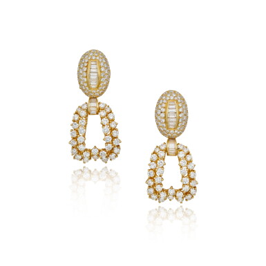 View full screen - View 1 of Lot 205. Pair of Gold and Diamond 'Day and Night' Earclips.