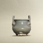 A Junyao purple-splashed handled tripod incense burner, Jin - Yuan dynasty | 金至元 鈞窰月白釉紫斑三足爐