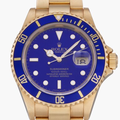 View full screen - View 1 of Lot 57. Submariner, Reference 16618 | A yellow gold wristwatch with date and bracelet | Circa 2006.