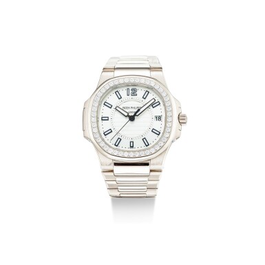 View full screen - View 1 of Lot 105. PATEK PHILIPPE | NAUTILUS, REFERENCE 7010, A WHITE GOLD AND DIAMOND-SET BRACELET WATCH WITH DATE, CIRCA 2008.