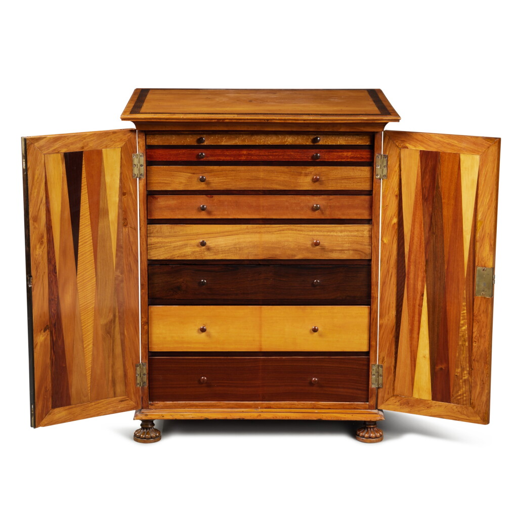 View full screen - View 1 of Lot 501. A George IV Satinwood, Snakewood and Specimen Wood Collector's Cabinet, Circa 1825, Probably Colonial or West Indian.