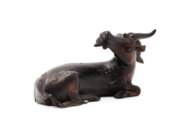 View full screen - View 1 of Lot 64. A bronze figure of a recumbent, Qilin 17th century | 十七世紀 銅麒麟擺件.