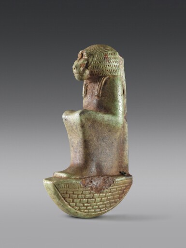 View full screen - View 1 of Lot 11. An Egyptian Green Faience Figure of a Baboon, 26th/30th Dynasty, 664-342 B.C..