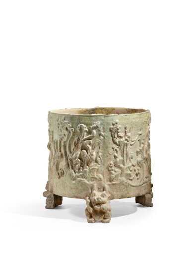View full screen - View 1 of Lot 2056. A large green-glazed tripod vessel, Han dynasty | 漢 綠釉神獸紋樽.