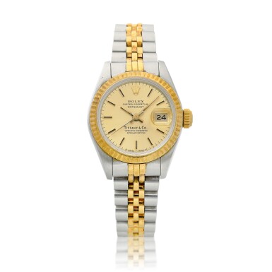 View full screen - View 1 of Lot 8042. DateJust, Reference 69173, A yellow gold and stainless steel wristwatch with date and bracelet, Retailed by Tiffany & Co., Circa 1988 | 勞力士 DateJust 型號69173 黃金及精鋼鏈帶腕錶,備日期顯示,由 Tiffany & Co. 發行,約1988年製.