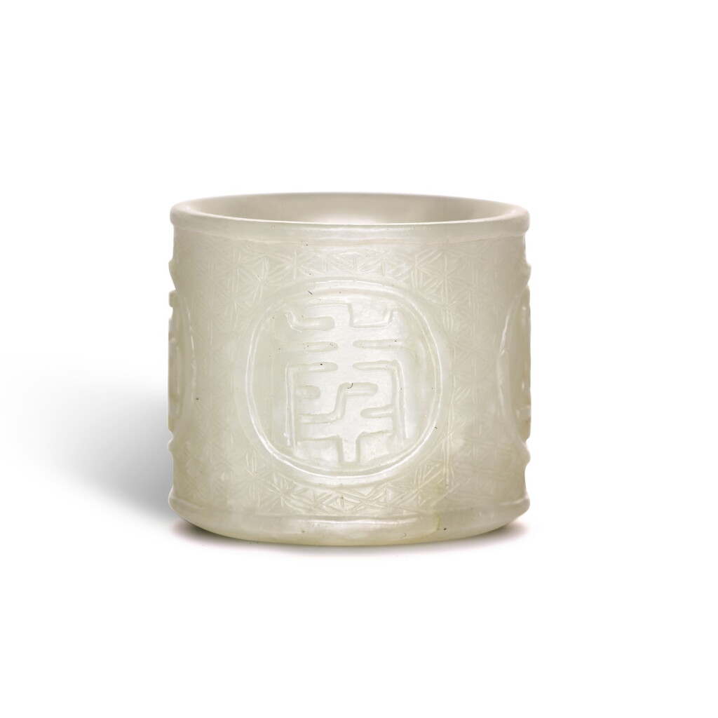 View full screen - View 1 of Lot 248. A WHITE JADE 'WAN SHOU WU JIANG' THUMB RING, QING DYNASTY, 19TH CENTURY | 清十九世紀 白玉「萬壽無疆」紋扳指.