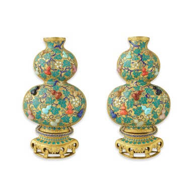 View full screen - View 1 of Lot 185. A rare pair of 'Imperial Tribute' champlevé enamel and hardstone-inlaid double-gourd wall vases, Qing dynasty, Qianlong period.