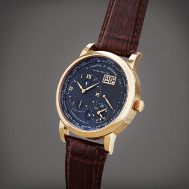 View full screen - View 1 of Lot 9. Lange 1 Zeitzone | A pink gold world time wristwatch with digital date display and power reserve indication | Circa 2007.