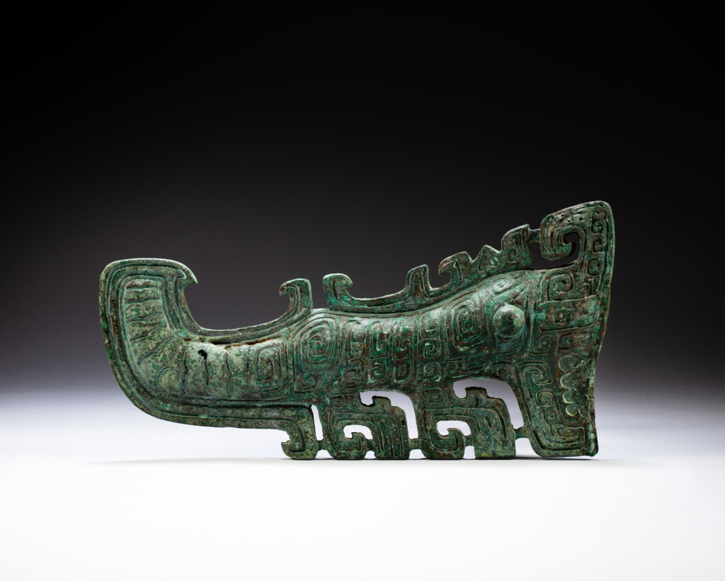 View full screen - View 1 of Lot 9. An archaic bronze ornament, Shang dynasty | 商 青銅夔紋飾.