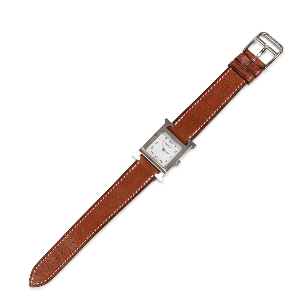 View full screen - View 1 of Lot 717. Heure H Reference HH1.210, a stainless steel quartz wristwatch.
