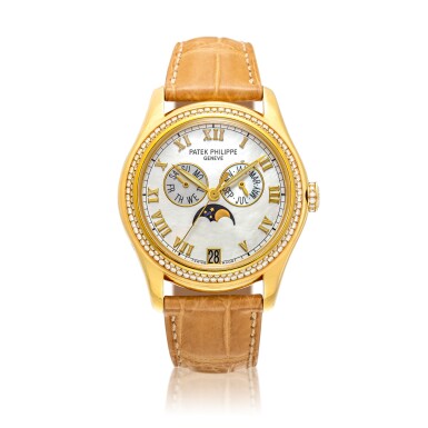 View full screen - View 1 of Lot 8007. Reference 4936 | A yellow gold and diamond-set annual calendar wristwatch with moon phases and mother-of-pearl dial, Circa 2006 | 百達翡麗 | 型號4936 | 黃金鑲鑽石年曆腕錶,備月相及珠母貝錶盤,約2006年製.