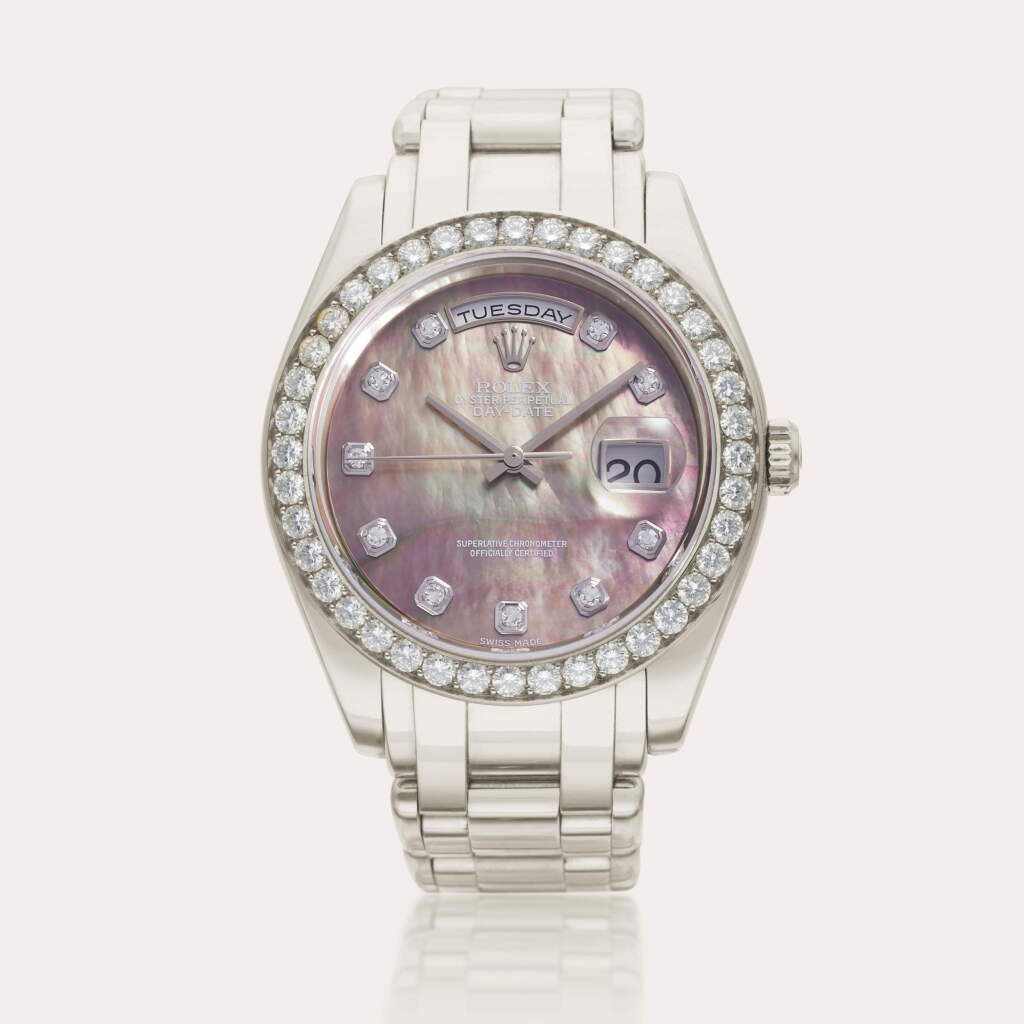 View full screen - View 1 of Lot 107. Reference 18946 Day-Date Pearlmaster | A platinum and diamond-set automatic wristwatch with day, date, bracelet and mother of pearl dial, Circa 2000.