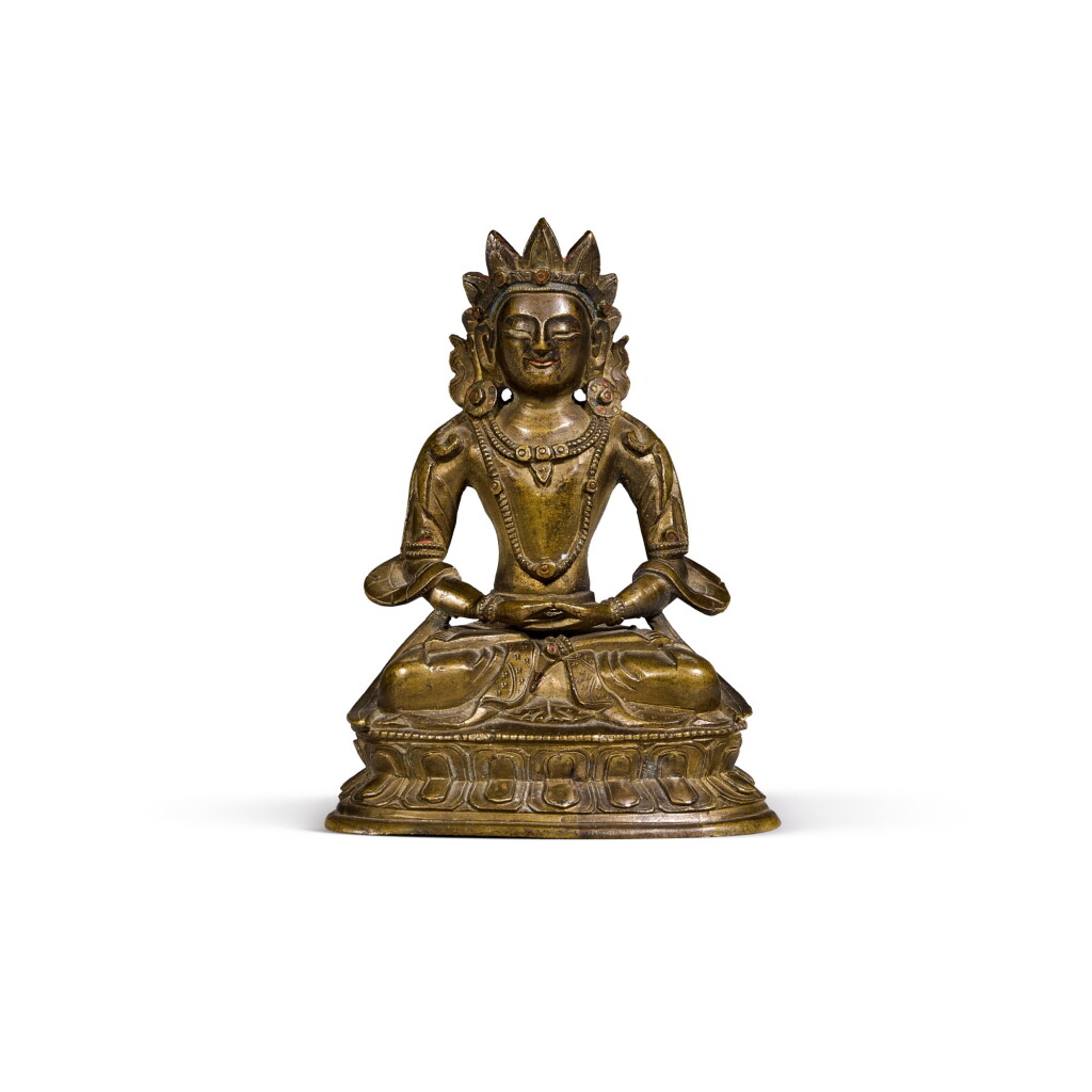 View full screen - View 1 of Lot 74. A small bronze figure of Amitayus Qing Dynasty, 18th/19th century | 清十八/十九世紀 鎏金銅無量壽佛坐像.