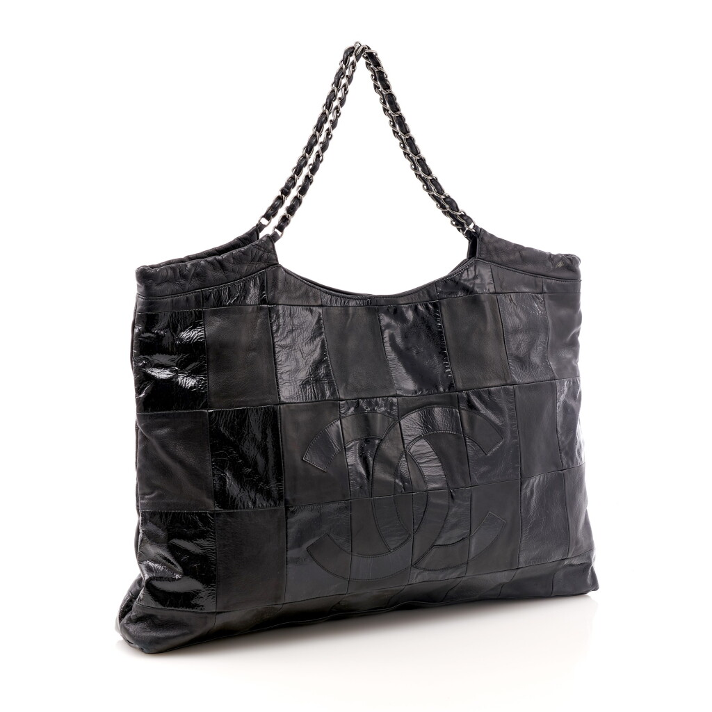 View full screen - View 1 of Lot 139. Black leather and black patent leather patchwork tote shoulder bag.