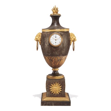 View full screen - View 1 of Lot 32. A FRENCH EMPIRE GILT BRONZE-MOUNTED TOLE PEINTE URN-FORM NIGHT PROJECTION TIMEPIECE, CIRCA 1810.
