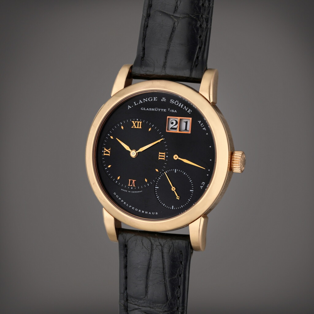 View full screen - View 1 of Lot 211. Reference 101.031 Lange 1 | A pink gold wristwatch with date and power reserve indication, Circa 2008.