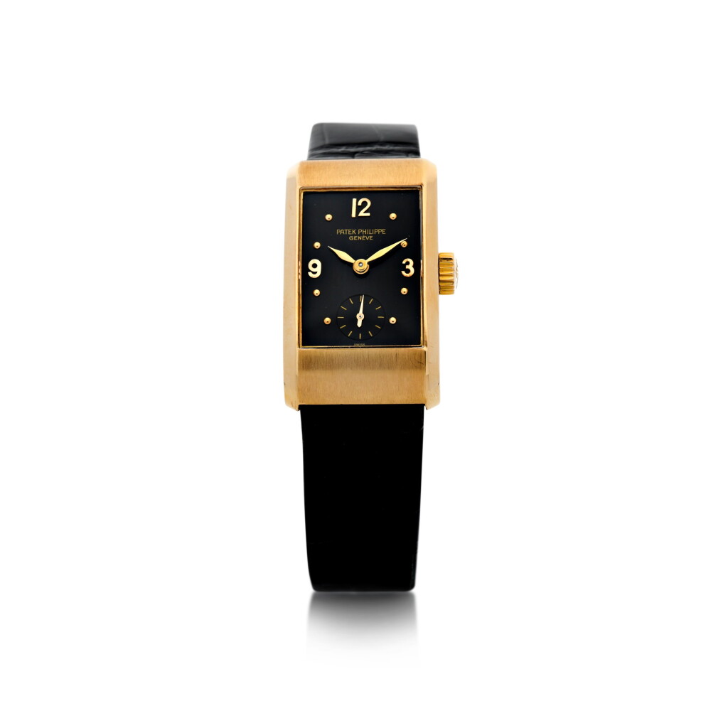 View full screen - View 1 of Lot 136. REFERENCE 1402 A RARE PINK GOLD RECTANGULAR WRISTWATCH, MADE IN 1938.