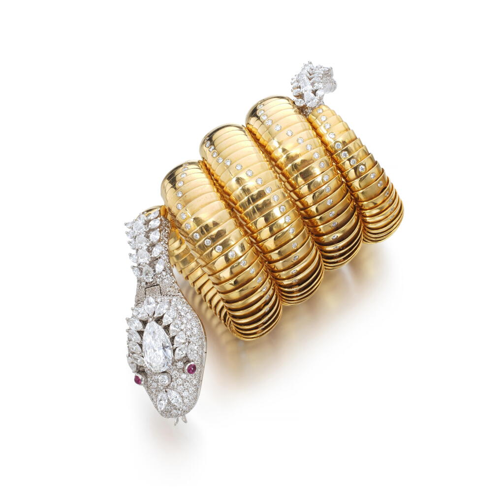 View full screen - View 1 of Lot 559. Iconic lady's gold, diamond and ruby wristwatch, 'Serpenti', circa 1968.