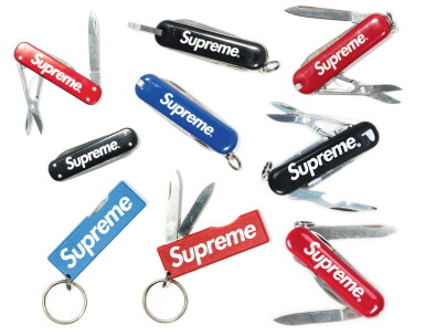 View full screen - View 1 of Lot 131. A GROUP OF 9 SUPREME POCKETKNIVES & MONEY CLIPS.