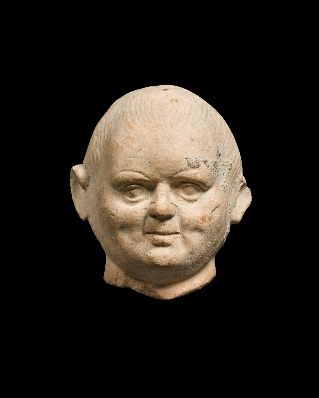 View full screen - View 1 of Lot 239. An Etruscan Terracotta Head of a Boy, circa 2nd Century B.C..