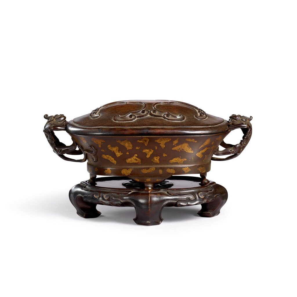 View full screen - View 1 of Lot 3665. A gold-splashed bronze 'chilong' incense burner 17th century, Xuande mark | 十七世紀 銅灑金螭龍耳爐 《大明宣德年製》仿款.