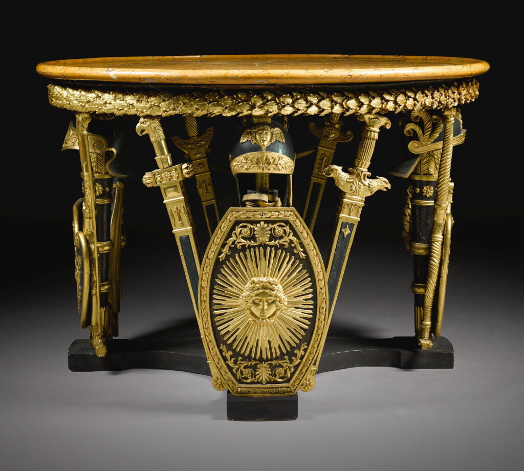View full screen - View 1 of Lot 33. An Italian ebonised and parcel-gilt circular centre table, Milan early 19th century.