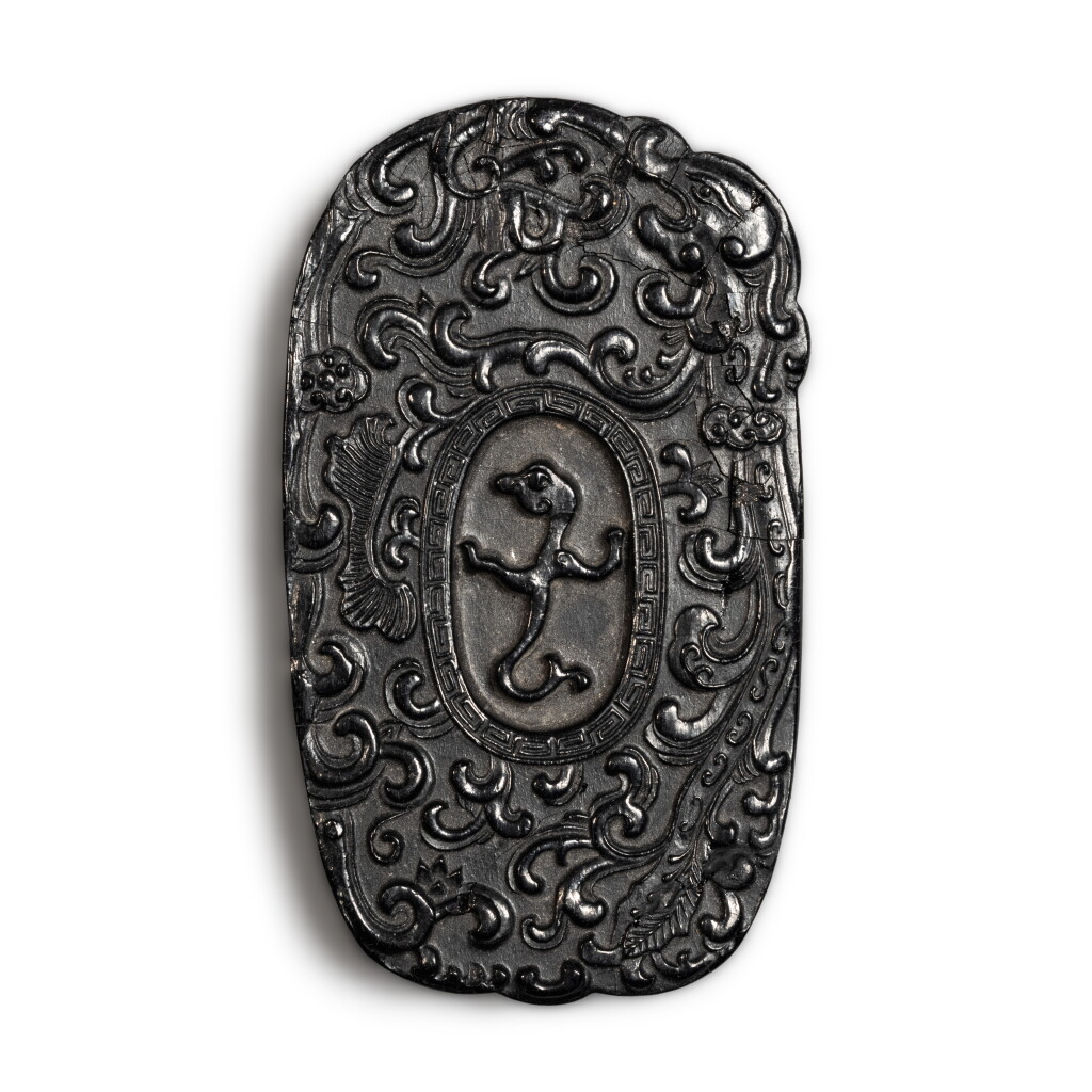View full screen - View 1 of Lot 683. A carved 'kuilong' ink cake, Qing dynasty, 18th century | 清十八世紀 夔龍紋墨.