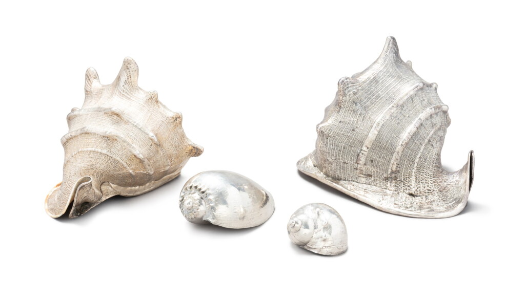 View full screen - View 1 of Lot 21. A group of four silver-covered seashells, Buccellati, Milan, circa 1980 | Ensemble de quatre coquillages recouverts d'argent par Buccellati, Milan, vers 1980 .