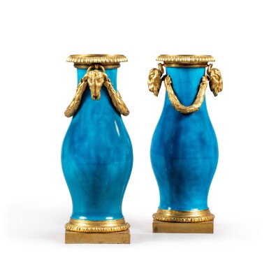 View full screen - View 1 of Lot 169. A pair of gilt-bronze mounted blue enameled porcelain vases, China, Qing dynasty, Kangxi period and Louis XVI style, late 19th century | Paire de vases en porcelaine émaillée bleu turquoise,Chine, dynastie Qing, époque Kangxi, monture de bronze doré de style Louis XVI, fin XIXe siècle.
