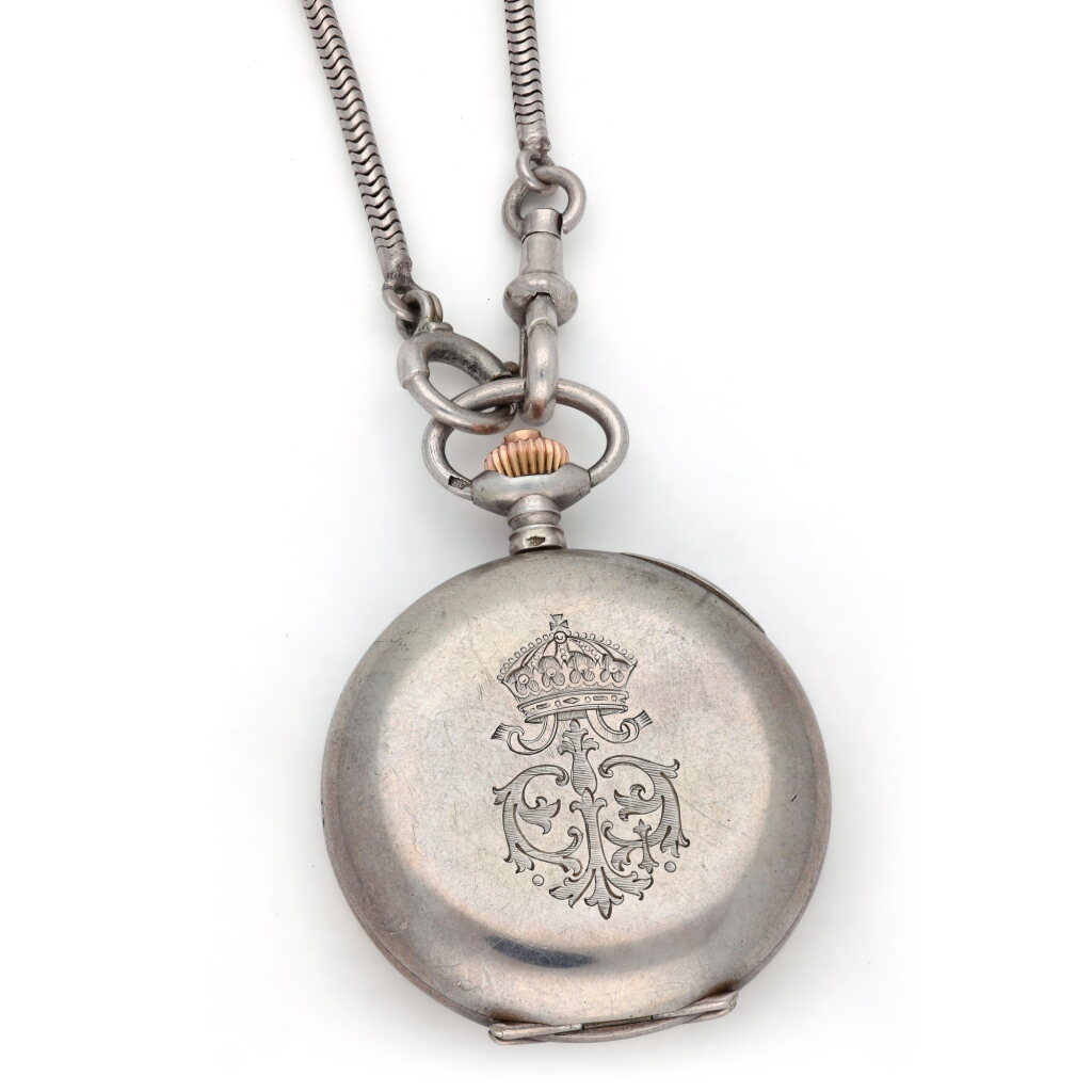 View full screen - View 1 of Lot 1116. A small silver half-hunting cased cylinder watch with associated chain Circa 1900.