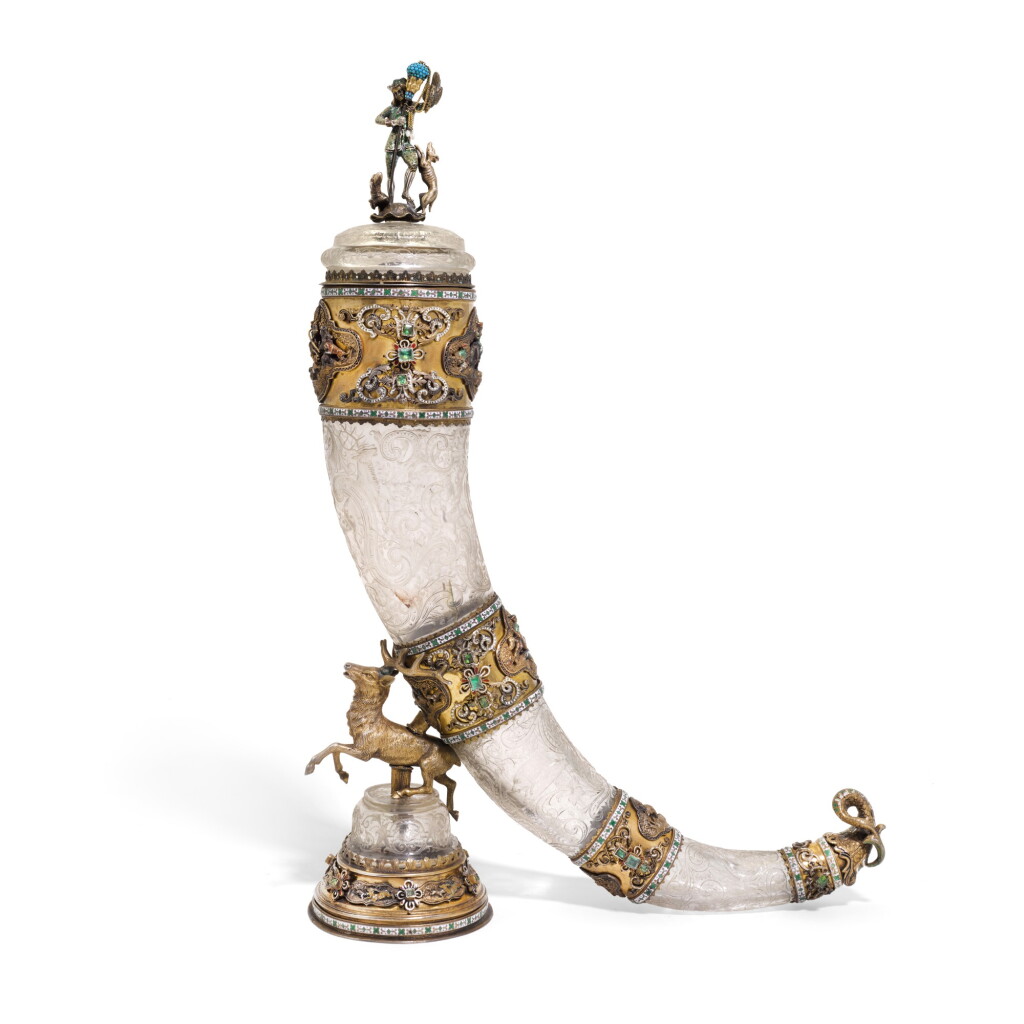 View full screen - View 1 of Lot 130. AN IMPRESSIVE ROCK-CRYSTAL DRINKING HORN WITH JEWELLED SILVER-GILT AND ENAMEL MOUNTS, LEOPOLD WEININGER, VIENNA, LATE 19TH CENTURY.
