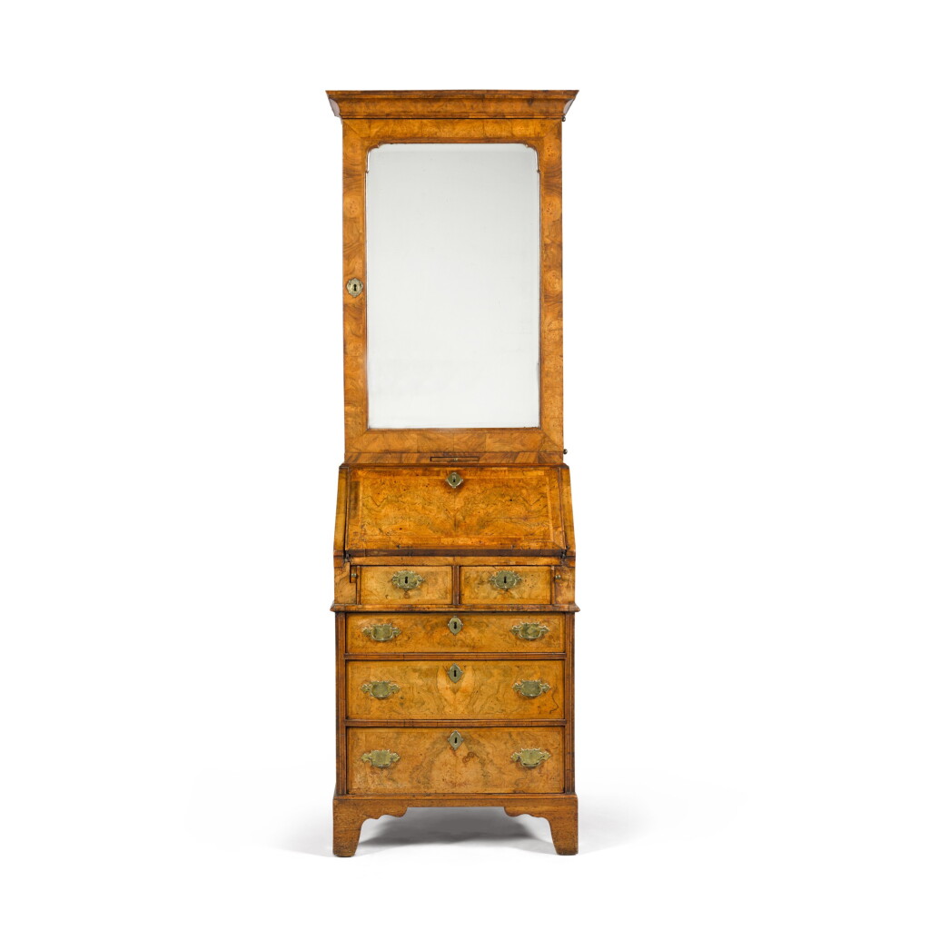 View full screen - View 1 of Lot 18. A George II walnut and burr walnut bureau-cabinet, circa 1730, attributed to John Phillips.