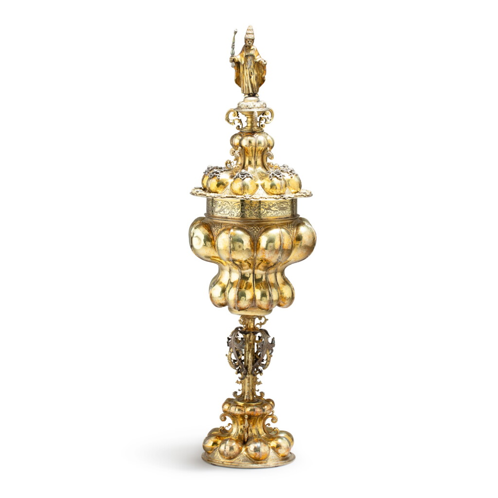 View full screen - View 1 of Lot 315. A large German parcel-gilt silver cup and cover, the cup, Heinrich Staub, the cover, Jeremias Ritter, Nurnberg, circa 1620.