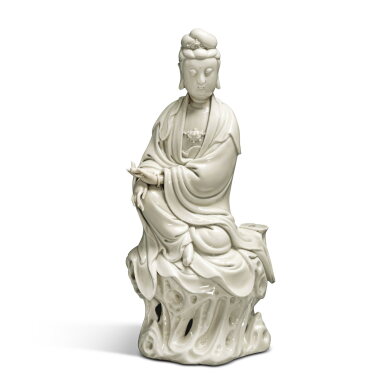 View full screen - View 1 of Lot 413. A 'Dehua' seated figure of Guanyin, 17th / 18th century | 十七 / 十八世紀 德化白釉觀音坐像.