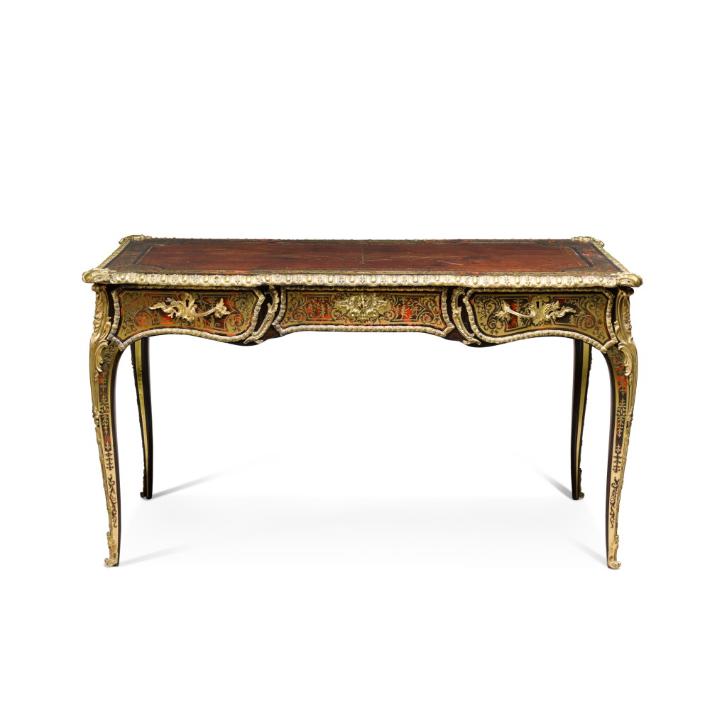 View full screen - View 1 of Lot 139. A Napoleon III gilt-bronze mounted brass, tortoiseshell and rosewood 'Boulle' marquetry bureau plat, late 19th century.