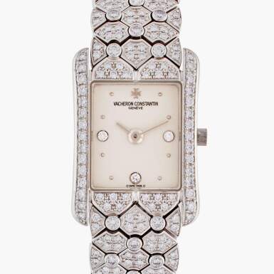 View full screen - View 1 of Lot 534. Reference 27021/1 | A white gold and diamond-set wristwatch with bracelet, Circa 1985.