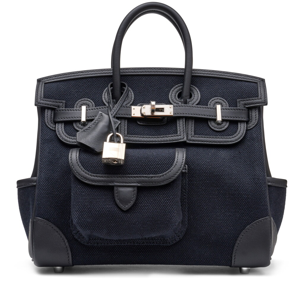 View full screen - View 1 of Lot 1349. Limited Edition Black Swift and Canvas Cargo Birkin 25 Palladium Hardware, 2022.