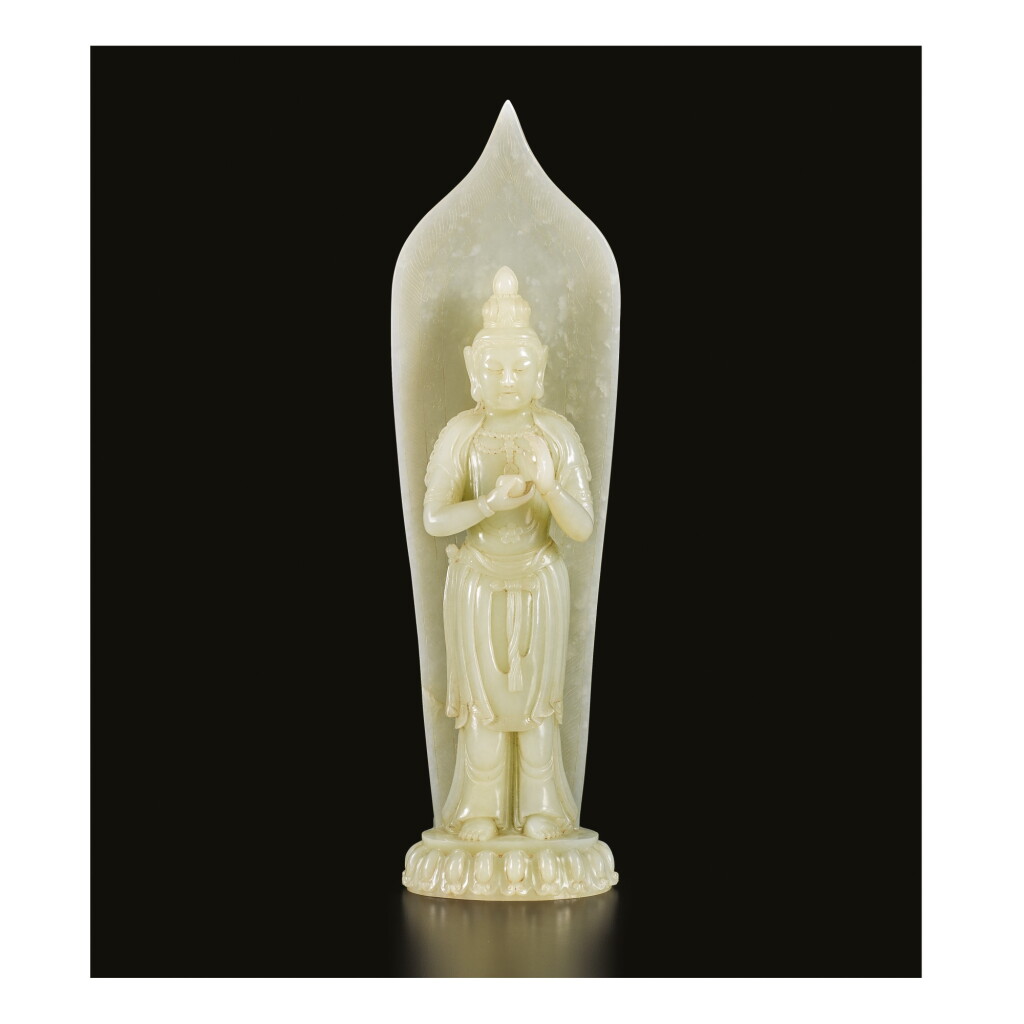 View full screen - View 1 of Lot 654. A WHITE JADE FIGURE OF GUANYIN, QING DYNASTY, LATE 19TH / EARLY 20TH CENTURY .