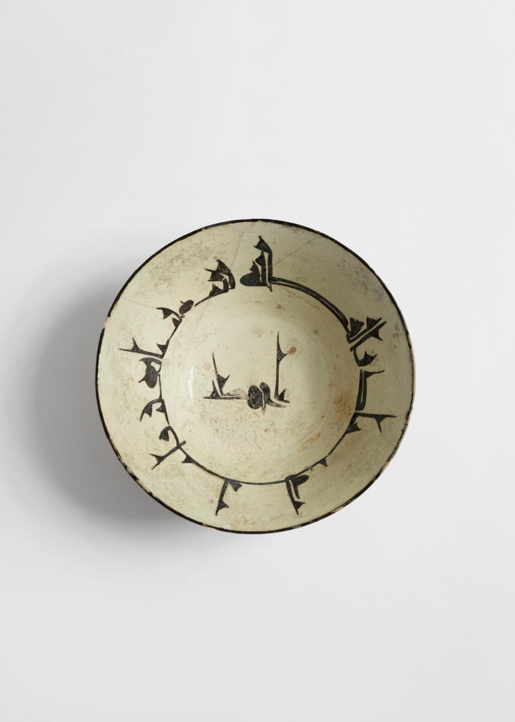 View full screen - View 1 of Lot 365. A Calligraphic Pottery Bowl, East Persia or Transoxiana, 11th Century.