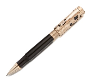 View full screen - View 1 of Lot 10. MONTBLANC | A LIMITED EDITION BROWN RESIN AND CHAMPAGNE TONE GOLD PLATED SKELETONIZED CAP OVERLAY ROLLERBALL PEN, CIRCA 2005.