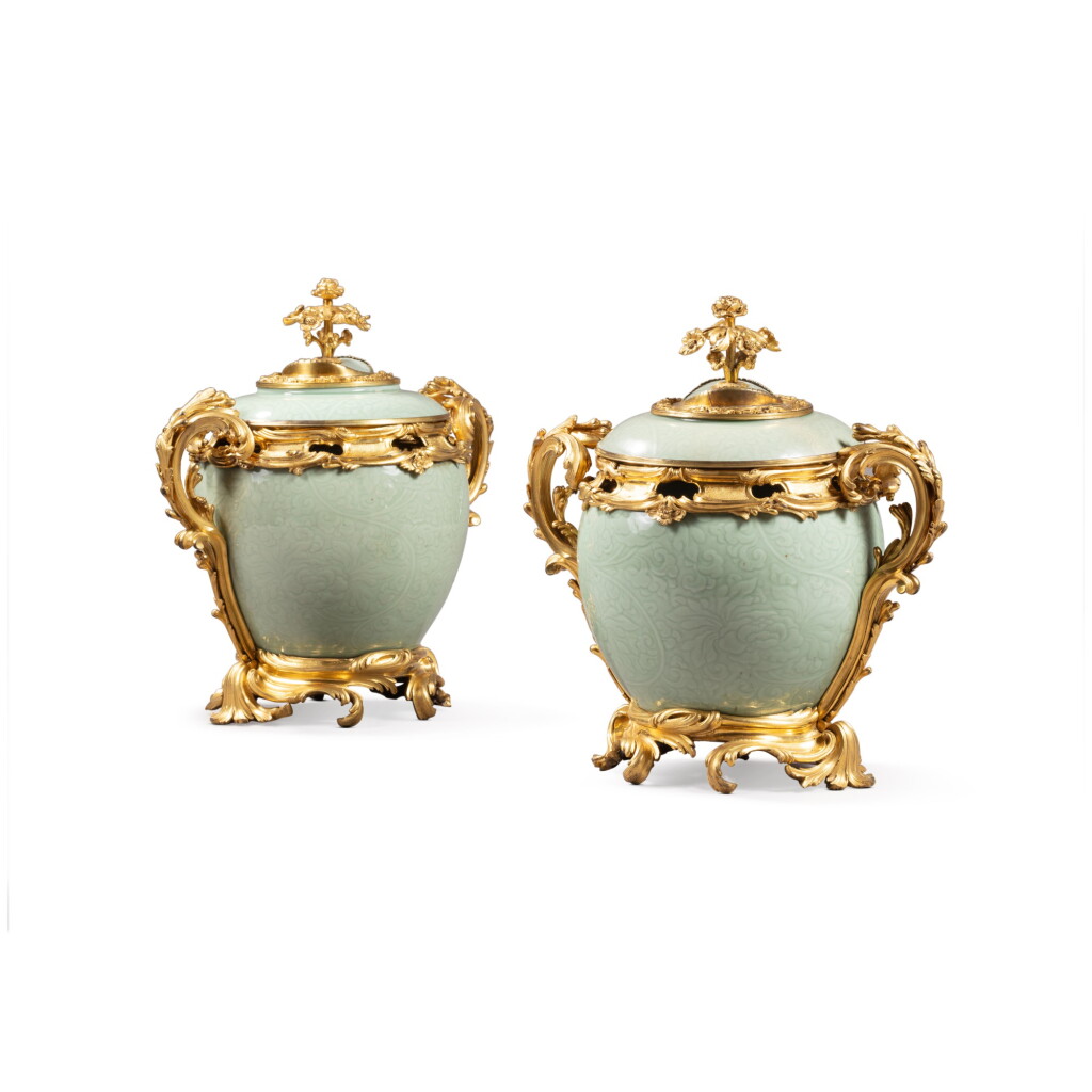 View full screen - View 1 of Lot 31. A pair of gilt-bronze mounted Chinese celadon pot-pourri vases, the porcelain Kangxi (1662-1722), the mounts Louis XV, circa 1750-1755.