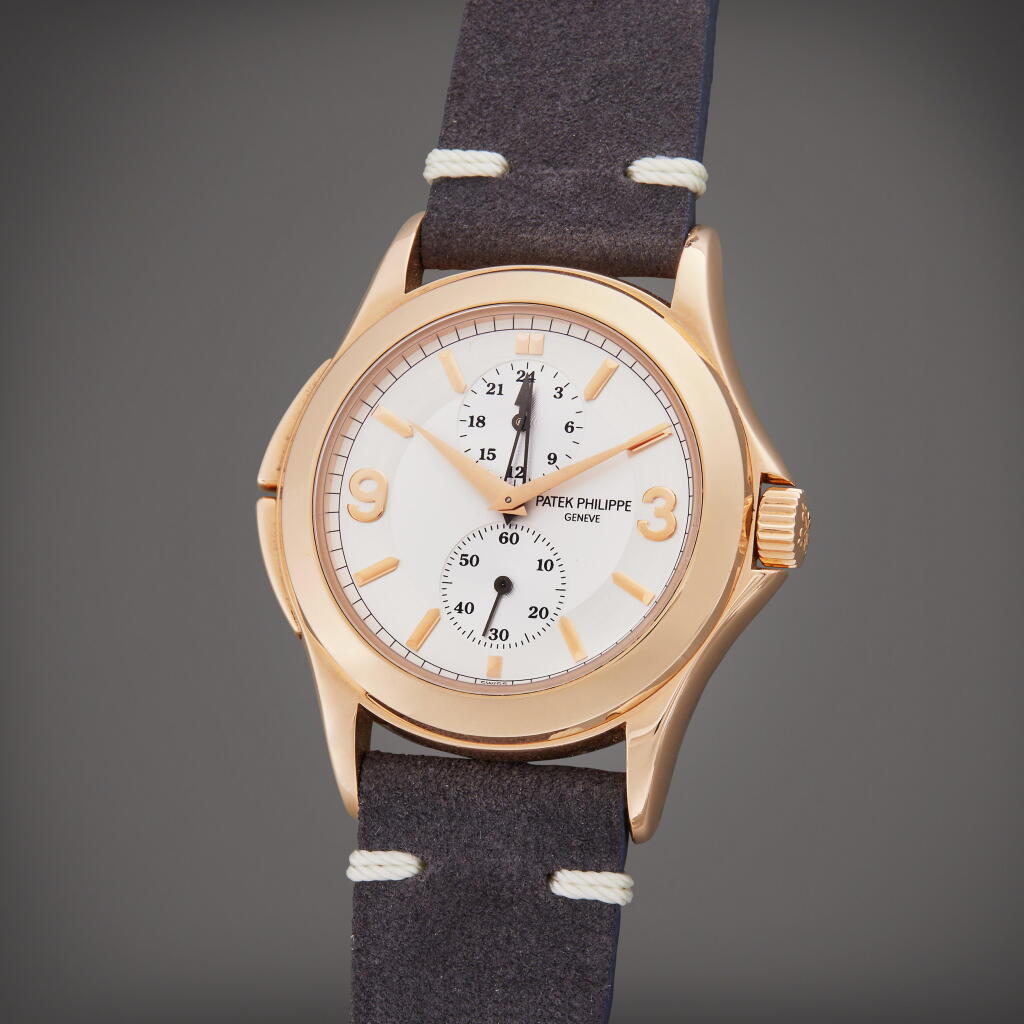 View full screen - View 1 of Lot 130. Reference 5134 Calatrava Travel Time | A pink gold dual time wristwatch with 24-hour indication, Circa 2000.