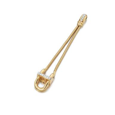 View full screen - View 1 of Lot 1076. Lady's gold and diamond wristwatch, 'Cadenas', circa 1944.