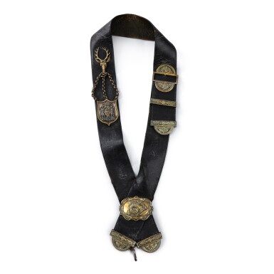 View full screen - View 1 of Lot 629. A French Restauaration leather and silvered bronze hunting harness for the duchesse de Berry, circa 1830 | Baudrier en cuir et bronze argenté de grand veneur des chasses de la duchesse de Berry d'époque Restauaration, vers 1830.