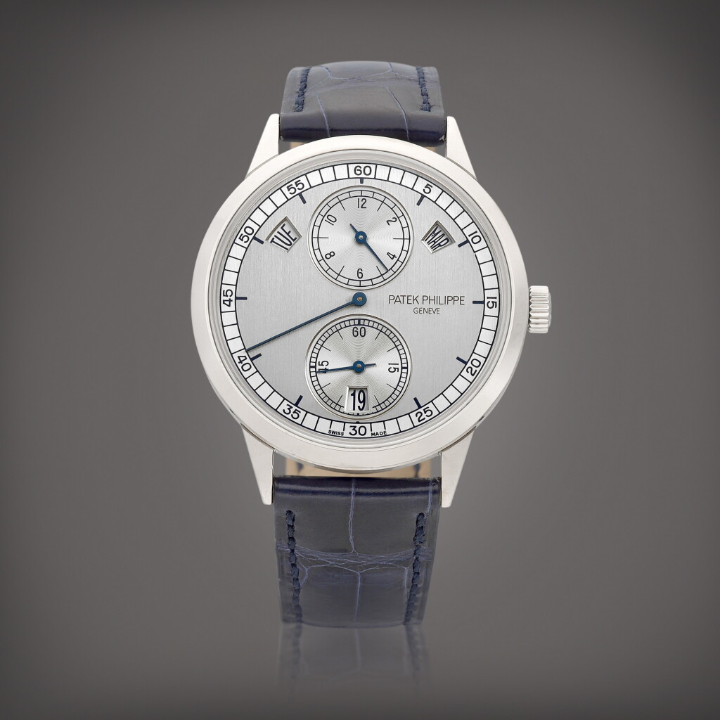 View full screen - View 1 of Lot 8620. Reference 5235 | A white gold annual calendar wristwatch with regulator dial, Circa 2012 | 百達翡麗 | 型號5235 | 白金年曆腕錶,備規範指針錶盤,約2012年製.