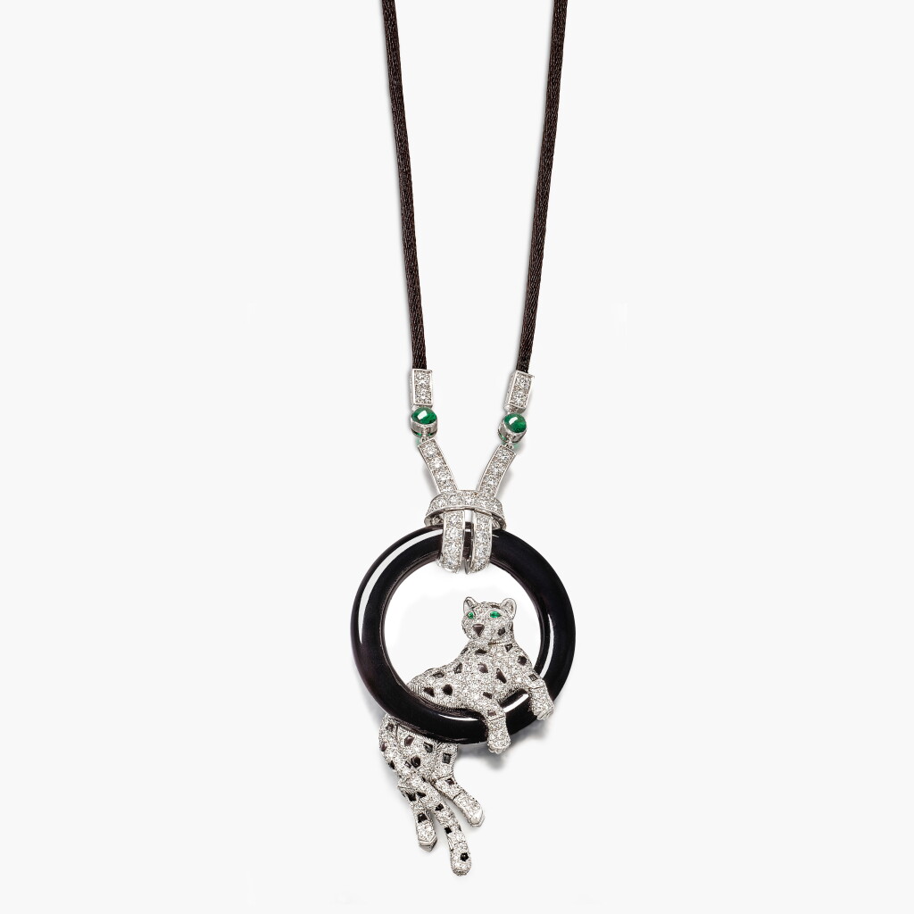 View full screen - View 1 of Lot 1656. Onyx, Diamond and Emerald 'Panthère' Pendent Necklace | 卡地亞 | 縞瑪瑙 配 鑽石 及 祖母綠 'Pantheré 掛墜項鍊.