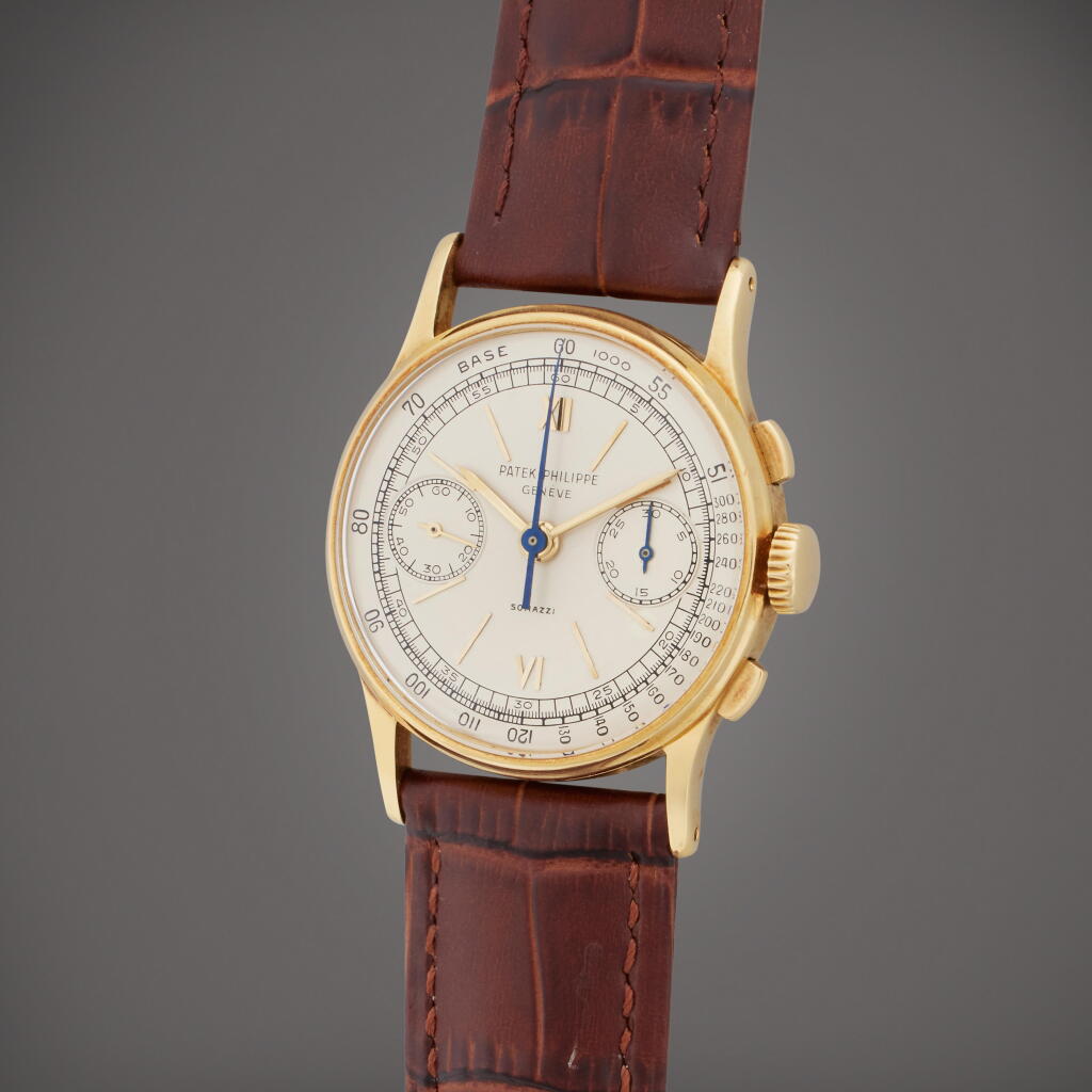 View full screen - View 1 of Lot 44. Reference 130 | Retailed by Somazzi: A yellow gold chronograph wristwatch, Made in 1947.