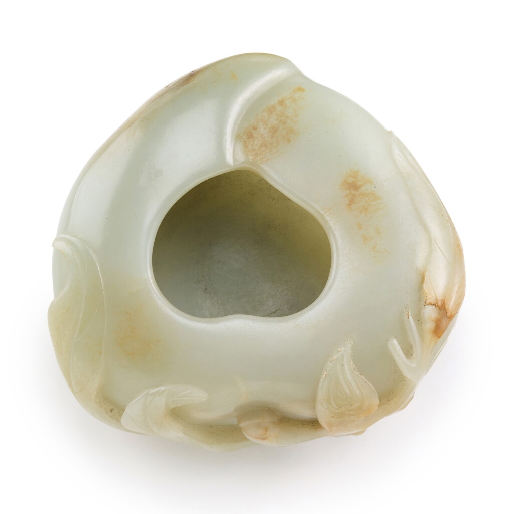 View full screen - View 1 of Lot 204. A CELADON AND RUSSET JADE 'PEACH' WATER POT, QING DYNASTY, 17TH/18TH CENTURY | 清十七/十八世紀 青玉桃形洗.